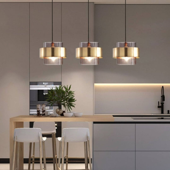 Lumos chandelier light in Australia, showcasing a minimalist modern design with a cement body and glass lampshade for soft, uniform illumination and stylish interior appeal.