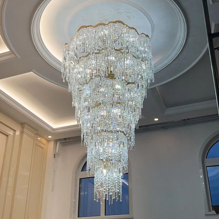 Bottom angle of Luxx chandelier highlighting detailed craftsmanship in luxurious room