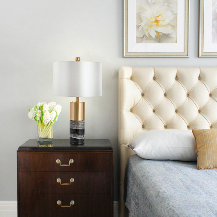 Marmar marble-based table lamp placed beside bed in modern bedroom