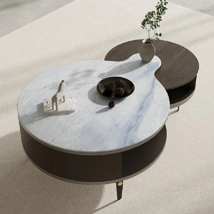 Top view of Mocha Marvel round nesting coffee table in elegant interior, sleek modern design