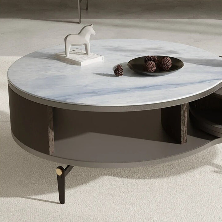 Left side partition detail view of Mocha Marvel round nesting coffee table in elegant interior