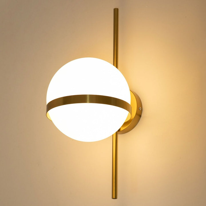 Modern gold round wall lamp with sleek wall mount, providing stylish ambient lighting for contemporary interiors