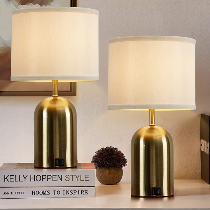 Modern bedside lamp with sleek metal base and touch dimming control