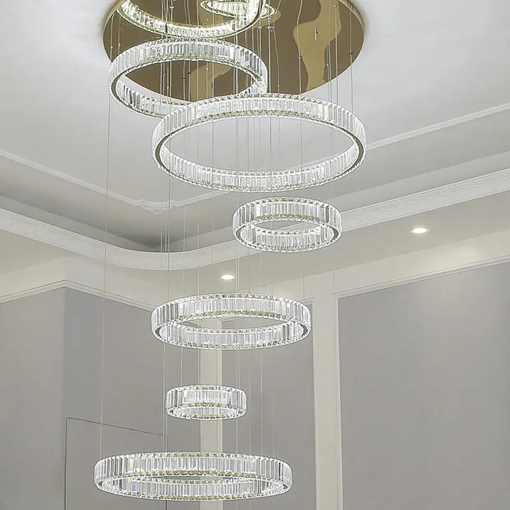 Front view of Moon 7-Ring modern crystal chandelier with chrome finish and layered circular crystal rings