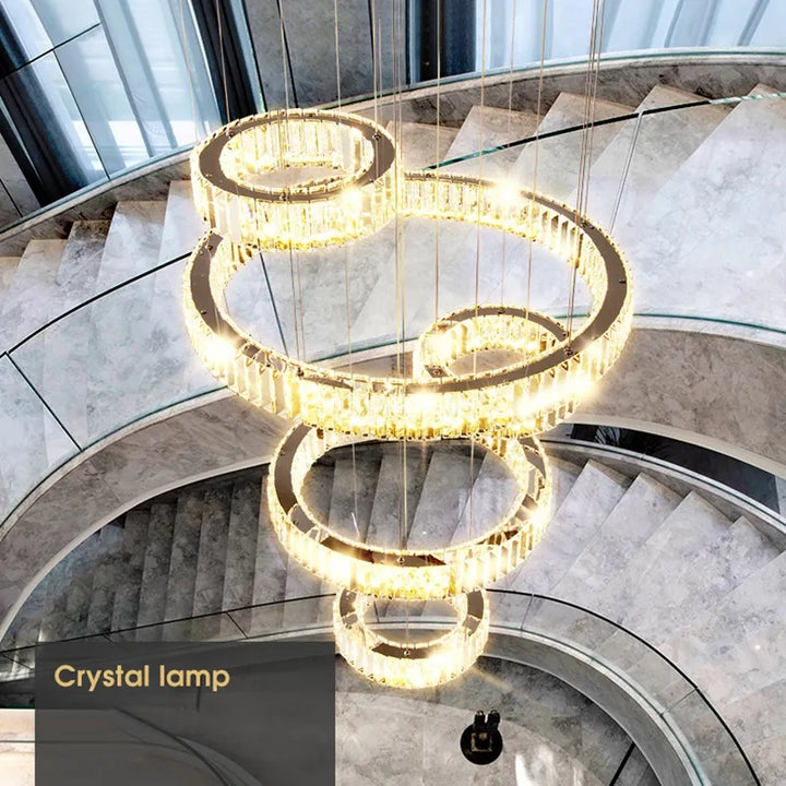Top view of Moon 7-Ring modern crystal chandelier with gold finish, showcasing layered circular rings and crystal detailing