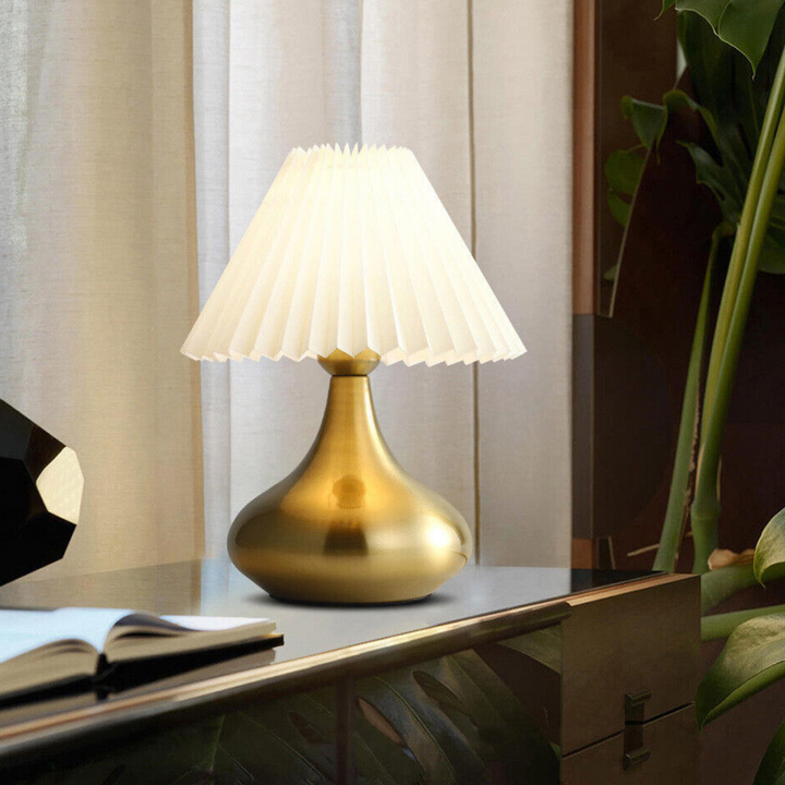 Mushroom-shaped modern bedside table lamp, sleek design with warm ambient lighting for cozy bedrooms