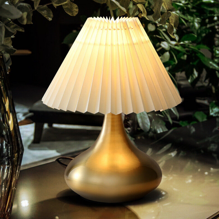 Mushroom-shaped modern bedside table lamp, sleek design with warm ambient lighting for bedrooms