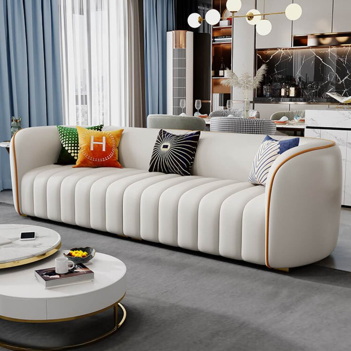 Side view of Napoleon leather sofa in elegant interior, showcasing classic design and rich upholstery