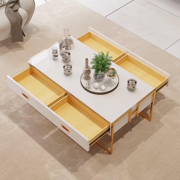 Nikki white coffee table with drawer open, showcasing hidden storage in modern minimalist design