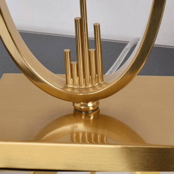 Detailed close view of Nova lamp stand with polished copper design