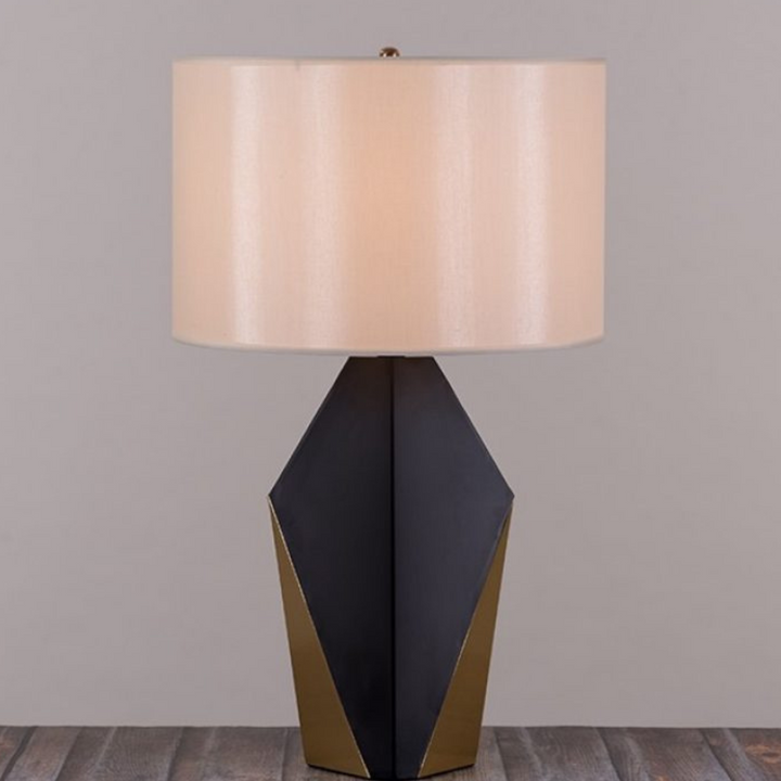 Oletalia table lamp with striking geometric design and sleek modern finish
