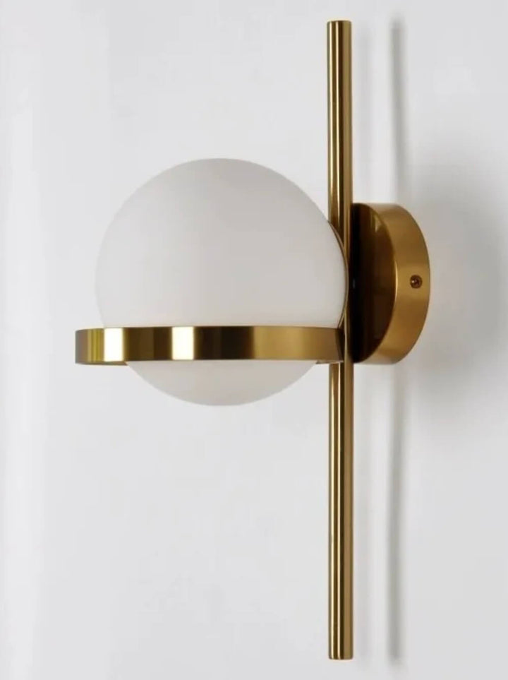 Modern gold round wall lamp with sleek wall mount, providing stylish ambient lighting for contemporary interiors