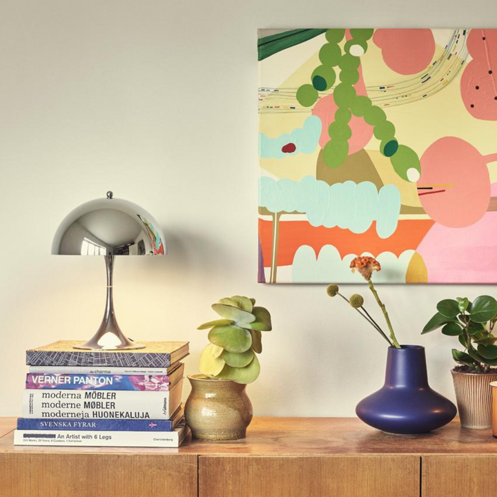 Orelli umbrella-shaped LED bedside table light with silver finish, sleek modern design, and ambient glow