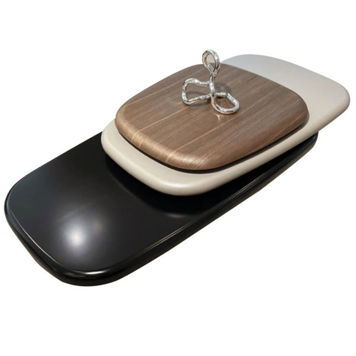 Pebble-shaped coffee table with smooth natural wood finish and rounded edges, ideal for contemporary living room decor