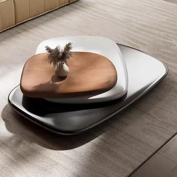 Pebble-shaped coffee table with smooth natural wood finish and rounded edges for modern living room decor