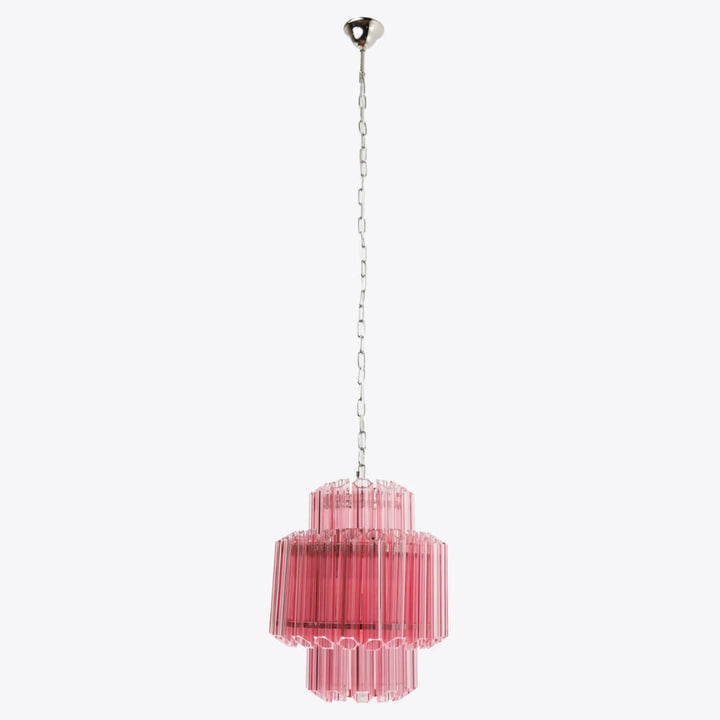 Piccolo Palermo chandelier hanging elegantly in living room, showcasing modern design and warm ambient light