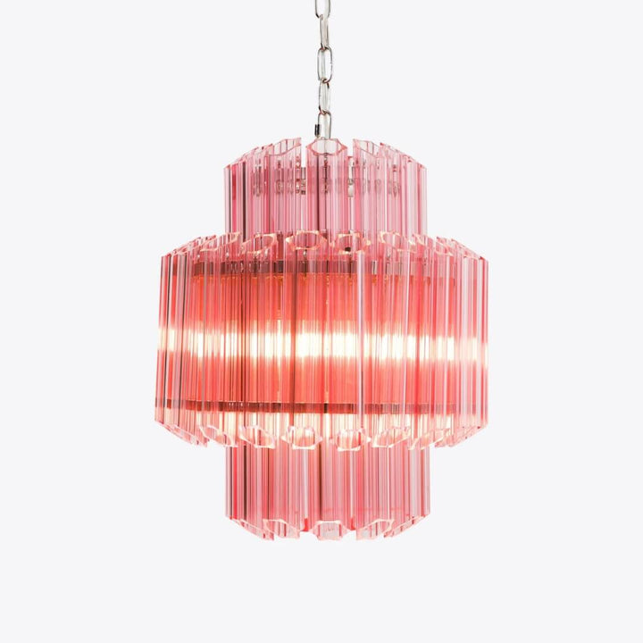 Piccolo Palermo chandelier hanging elegantly in living room, showcasing modern design and warm ambient light