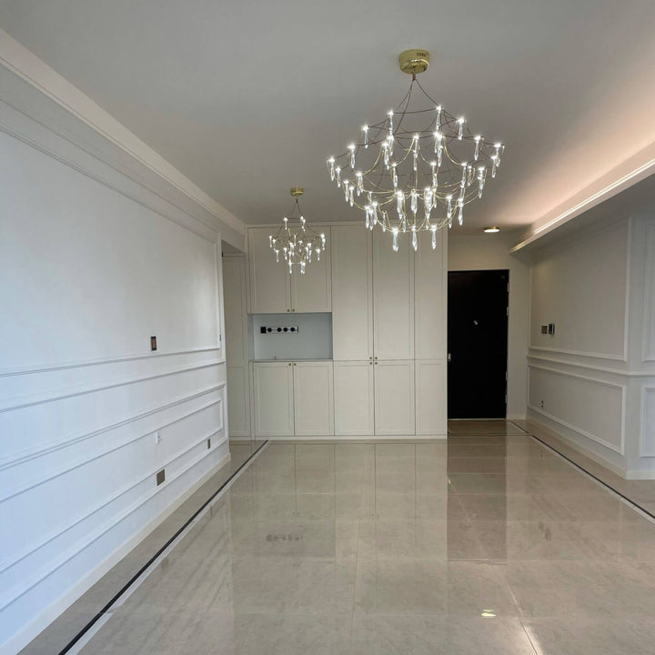 Prism premium Asfour crystal chandelier hanging in duplex stairwell, showcasing elegant design and sparkling crystals in luxury interior