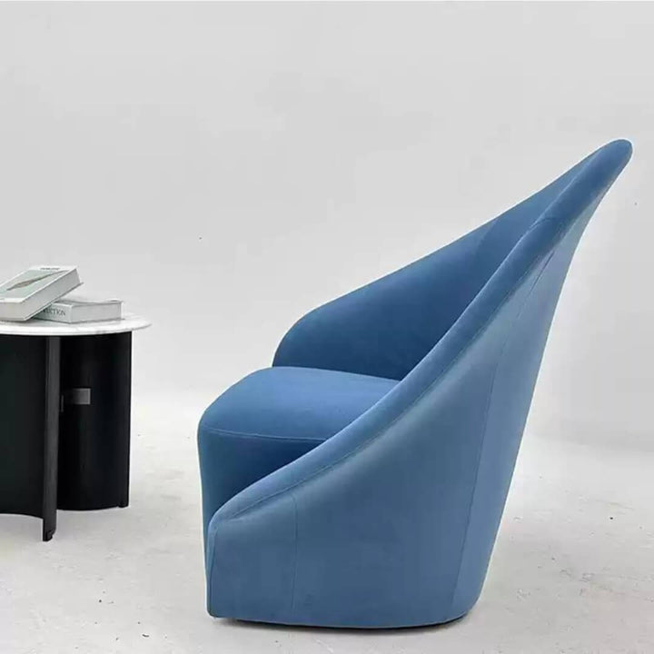 Side view of Riley Signature sofa seat showcasing sleek armrest, plush cushioning, and modern silhouette