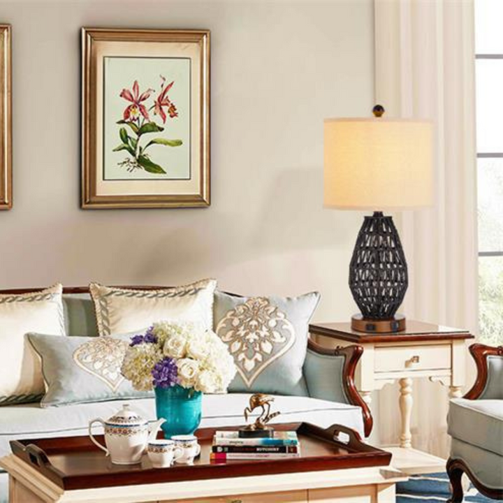 Modern rattan table lamp placed in stylish living room setting