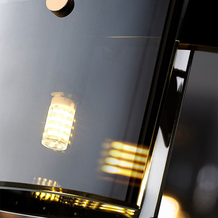 Close-up detailed view of Scintillate chandelier light in Australia, highlighting sparkling crystals and refined black and gold finishes.