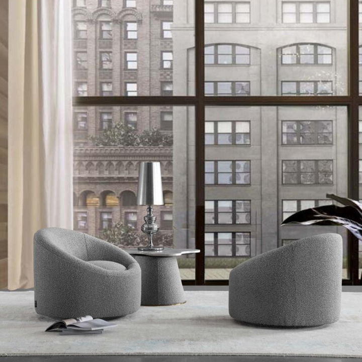 Signature upholstered swivel barrel chair, plush cushioning with sleek modern design for stylish spaces
