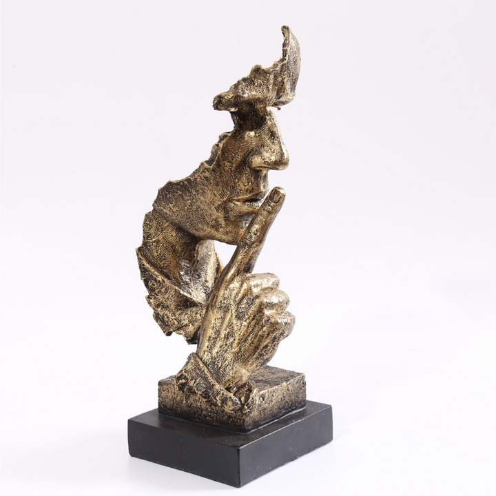 Modern Silence Is Golden resin sculpture showcasing half-faced artwork