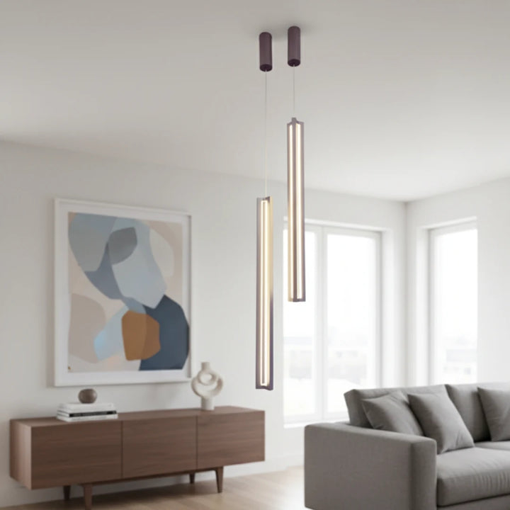 Sleek Vertical LED Pendant Light – Close-up view of modern minimalist lighting with elegant vertical design in a contemporary living room