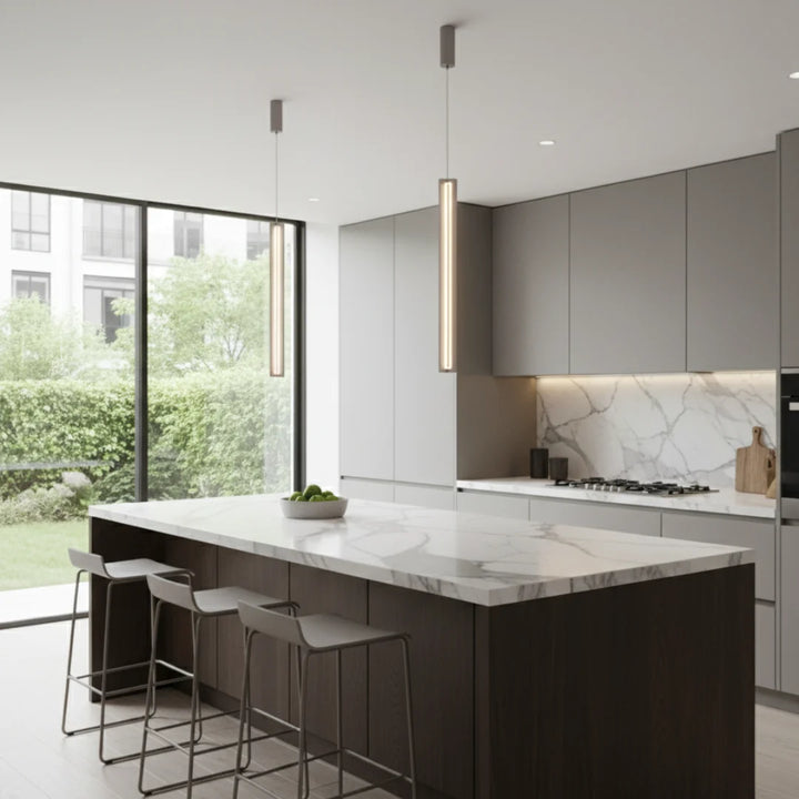 Sleek Vertical LED Pendant Light – Modern minimalist pendant illuminating a kitchen island with a clean, contemporary look