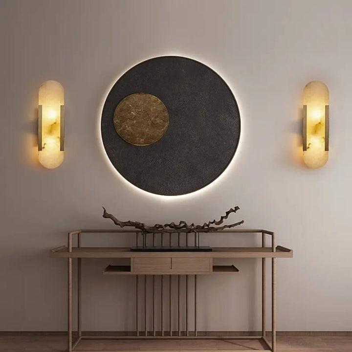 panish alabaster oval wall lights with two G9 bulbs installed on either side of a middle mirror – warm ambient lighting with natural stone finish.