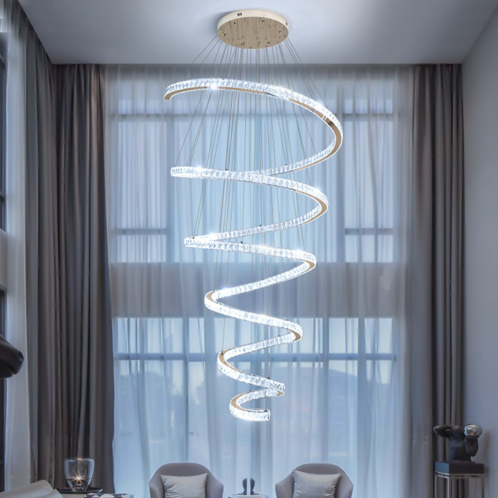 Spiral long chandelier illuminated with cool white lighting for a modern ambiance