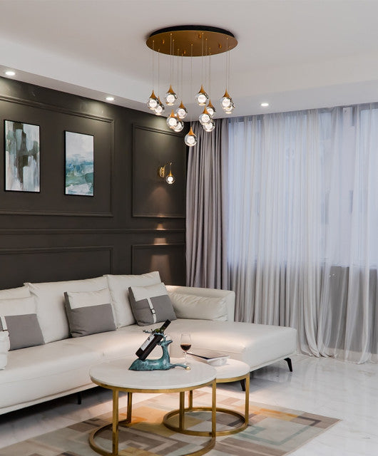 Twinkle large chandelier adorned with ball-shaped crystals, creating a dazzling centerpiece for grand interiors