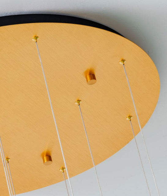 Close-up detail of Twinkle large chandelier’s copper plate showcasing polished finish and sturdy craftsmanship