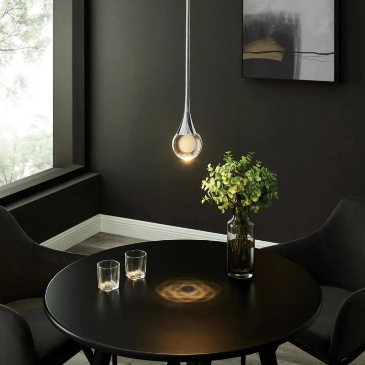 Twinkle Raindrop pendant light hanging gracefully, featuring cascading crystal droplets that create a sparkling and elegant illumination.