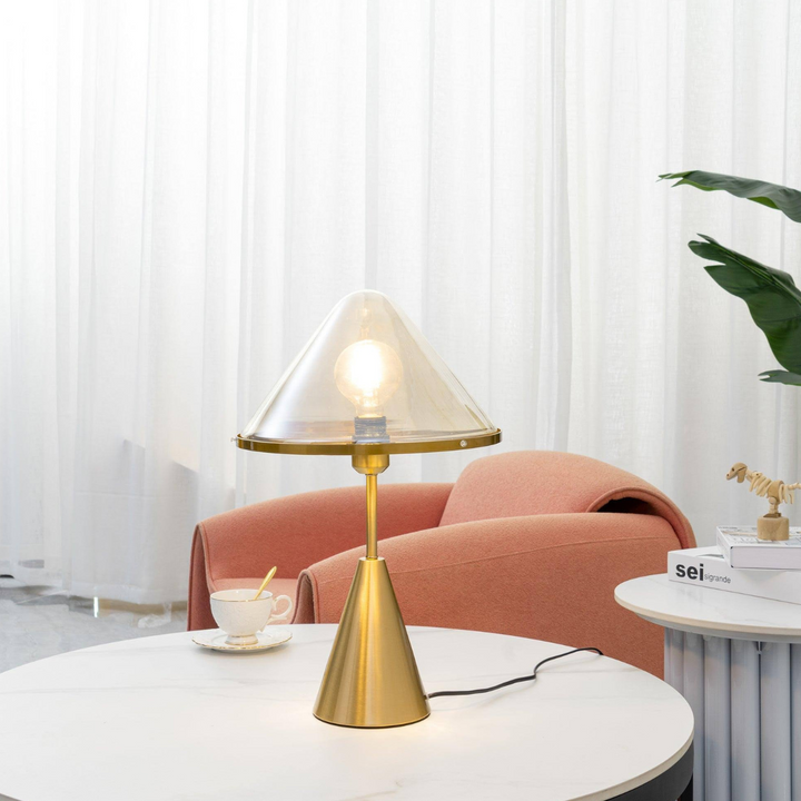 Venus clear glass shed table lamp placed on a tea table in modern living space