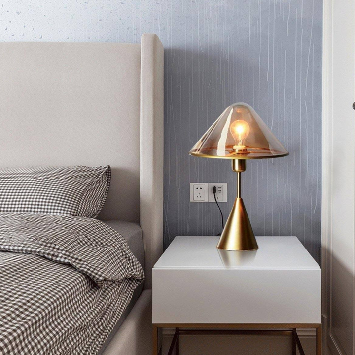 Elegant Venus bedside lamp with transparent glass shade for cozy ambient lighting