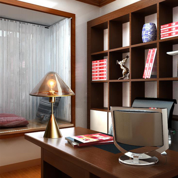 Stylish Venus table lamp with transparent glass shade in office setting