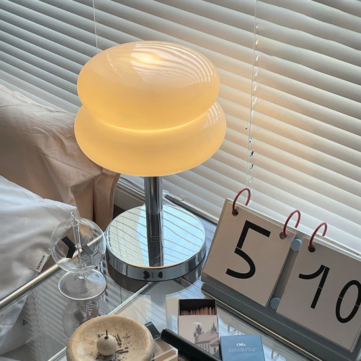 Top view of Virgo mushroom-shaped LED bedside table lamp, showcasing sleek modern design and finish
