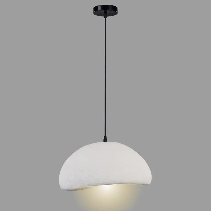 White pendant light with black cord on a gray background
