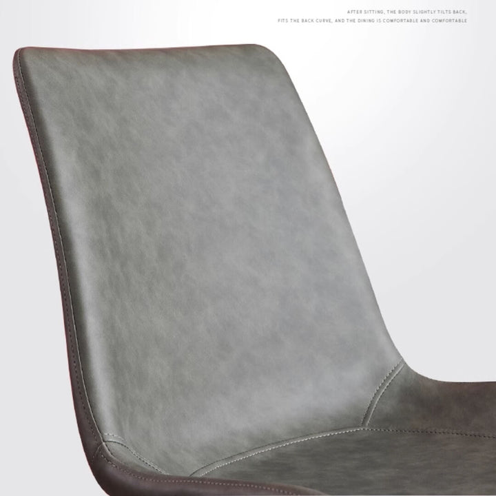 Side view of Y80 Hype Chair in gray upholstery, elegant interior with modern stylish design