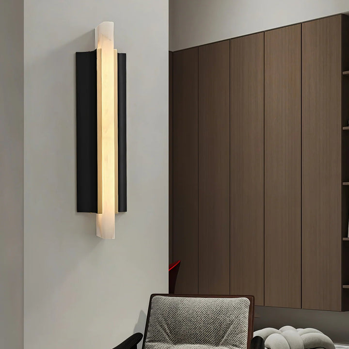 Alabaster Blade wall sconce modern lighting viewed from the living room side for sleek contemporary interiors