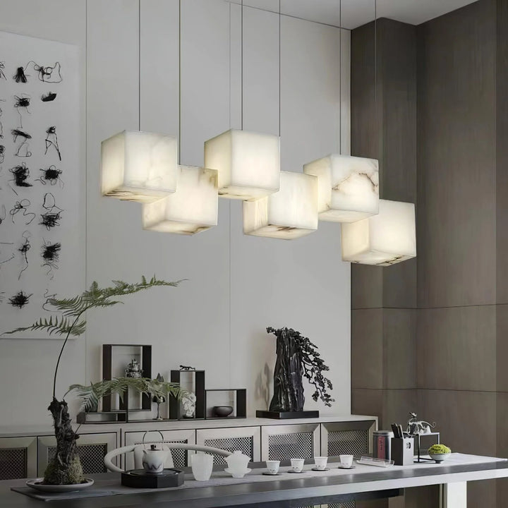 Alabaster box chandelier lighting above the dining table, providing a stylish and ambient glow.