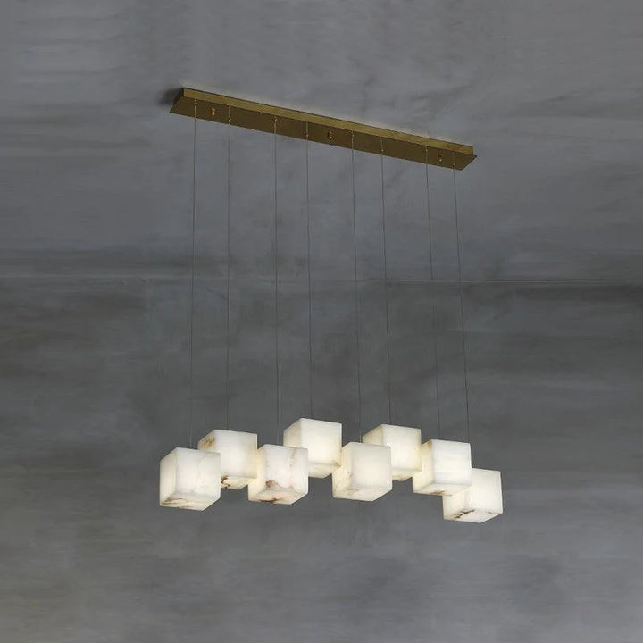 Below view of alabaster box chandelier lighting, showcasing its elegant design and glowing marble accents.