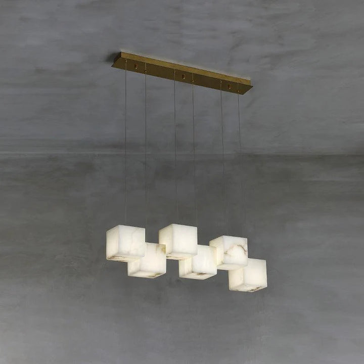 Front view of alabaster box chandelier lighting, highlighting its sleek design and marble square accents