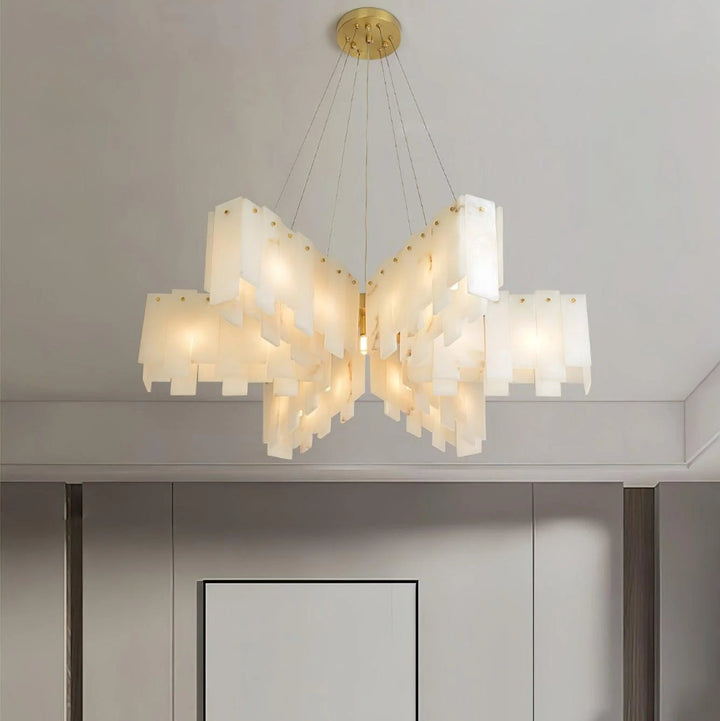Alabaster cascade tiered chandelier lighting shown hanging, highlighting elegant design in modern interior setting