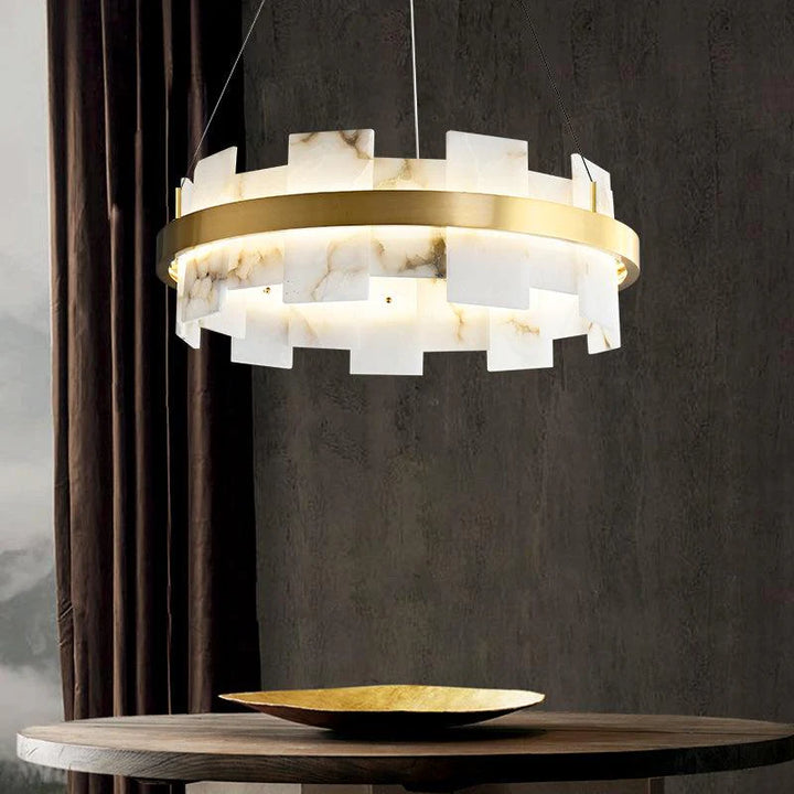 Alabaster Halo chandelier lighting above round table, elegant modern home decor