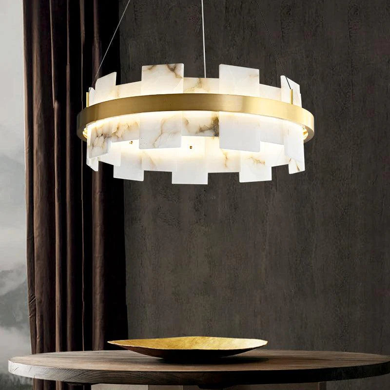 Alabaster Halo chandelier lighting above round table, elegant modern home decor