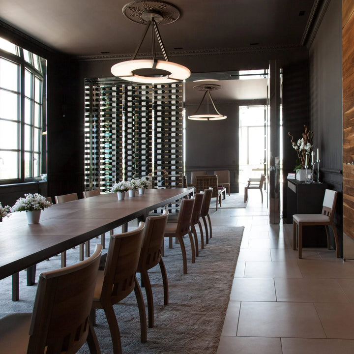 Alabaster Halo luxury pendant light in long dining room, elegant modern lighting for home interiors