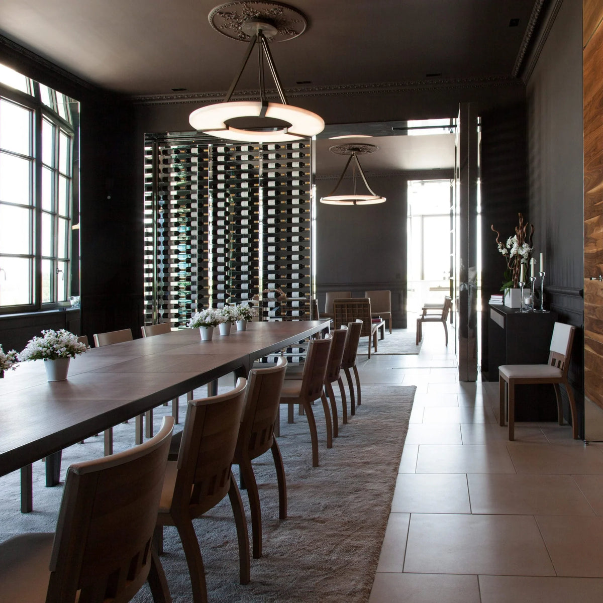 Alabaster Halo luxury pendant light in long dining room, elegant modern lighting for home interiors