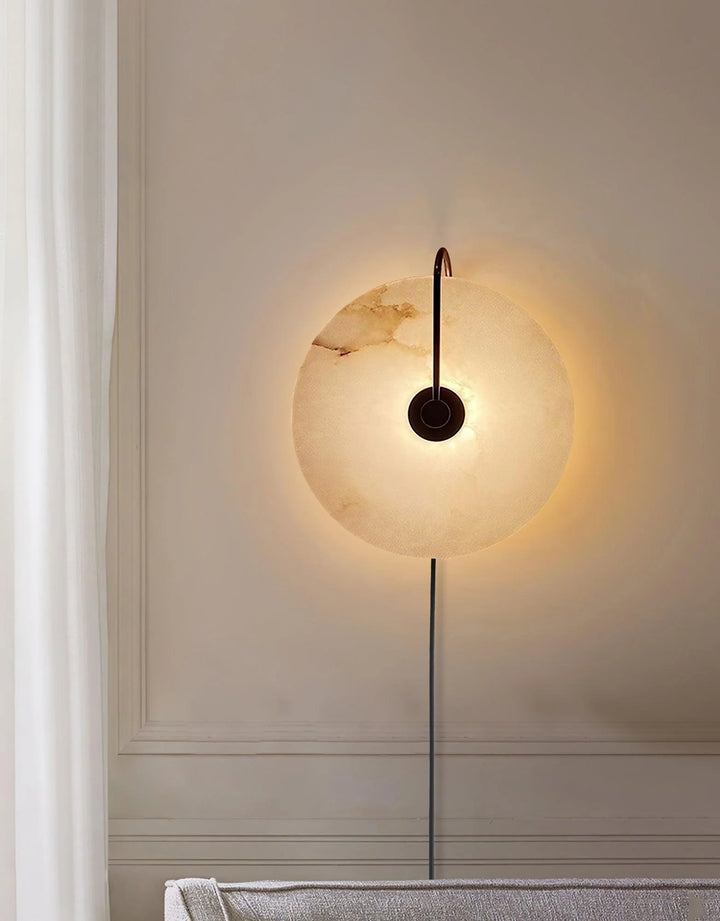 Alabaster LED plug-in wall lamp with warm light and natural stone texture, modern lighting fixture